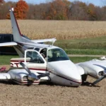 Small twin-engine plane damaged after crashing into an Ohio home and nearby field