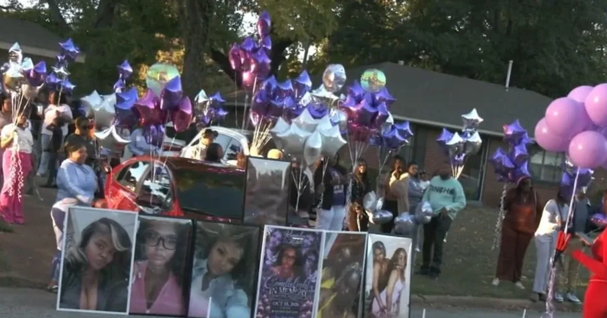 Mourners release purple and silver balloons during a vigil for Renisha Thompson in Memphis