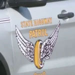 Investigators at the scene of a fatal two-vehicle crash on a rural Ohio road