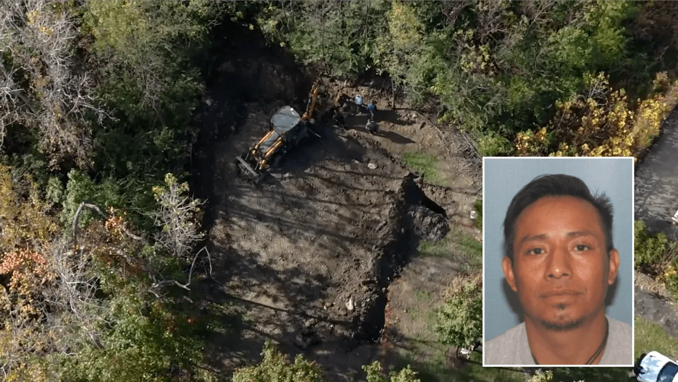 Police and heavy equipment dig in the backyard of a West Chester Township home during a missing person search
