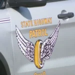 Damaged police cruiser at a Trotwood intersection after a crash involving an impaired driver