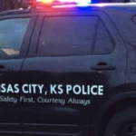 Police investigate an area under the 7th Street Trafficway Bridge in Kansas City, Kansas